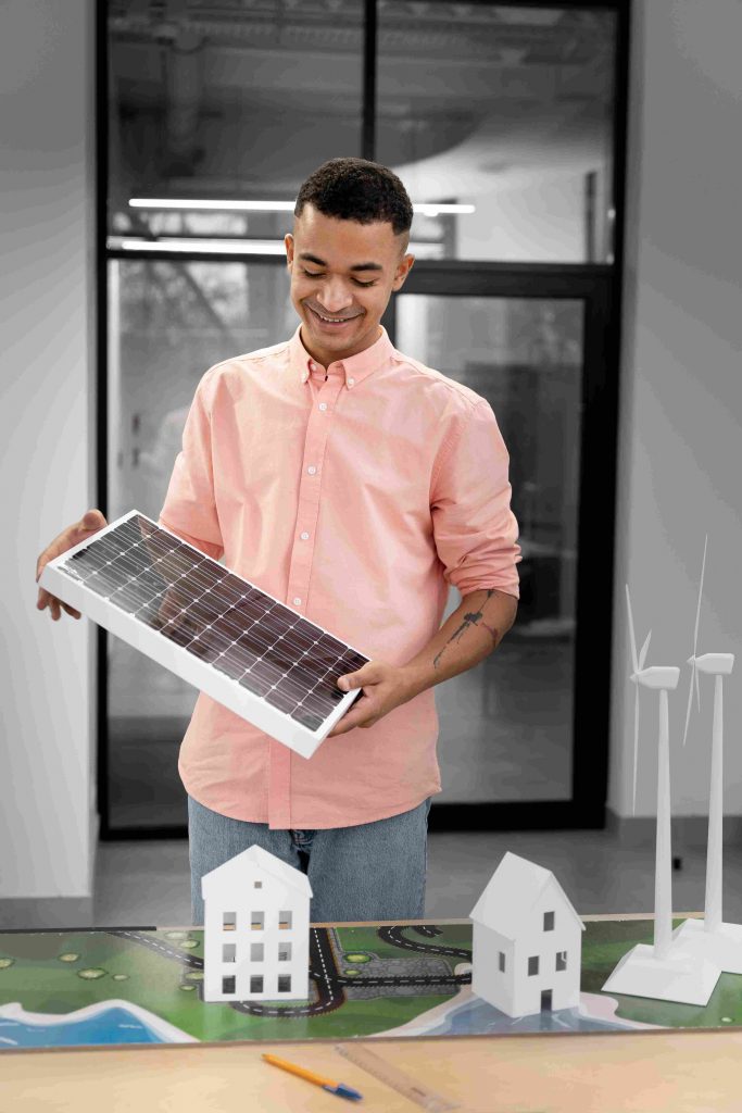 man holding solar panel in solar solution 24